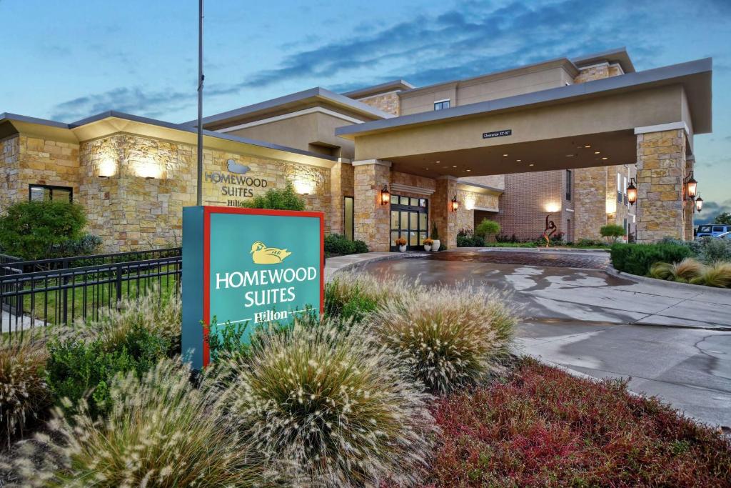 a honeymoon suite sign in front of a hotel at Homewood Suites by Hilton Dallas Arlington South in Arlington