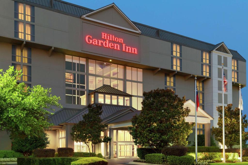 a rendering of the exterior of a hotel garden inn at Hilton Garden Inn Dallas/Market Center in Dallas