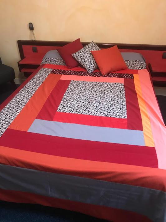 Postel nebo postele na pokoji v ubytování Chez Michel