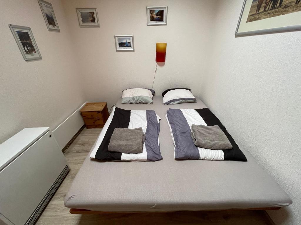Postel nebo postele na pokoji v ubytování White Rose apartment in Kulmhof
