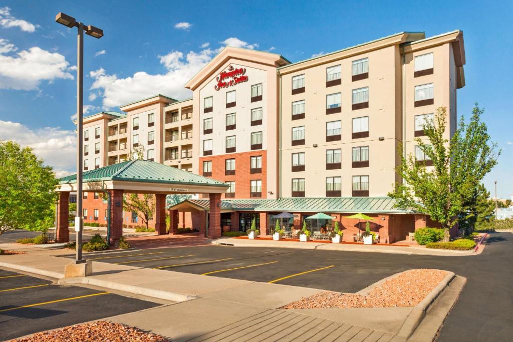 a rendering of a hotel with a parking lot at Hampton Inn & Suites Denver-Cherry Creek in Denver