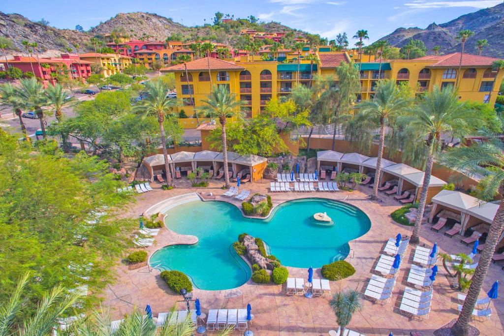 an aerial view of a resort with a swimming pool at Hilton Phoenix Tapatio Cliffs Resort in Phoenix