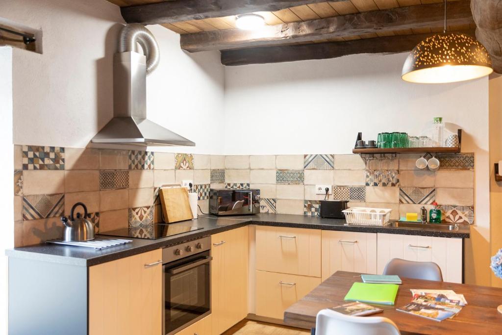 Kuchyň nebo kuchyňský kout v ubytování Casa Liñeiras