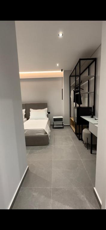 Ένα ή περισσότερα κρεβάτια σε δωμάτιο στο Villa Idrizi