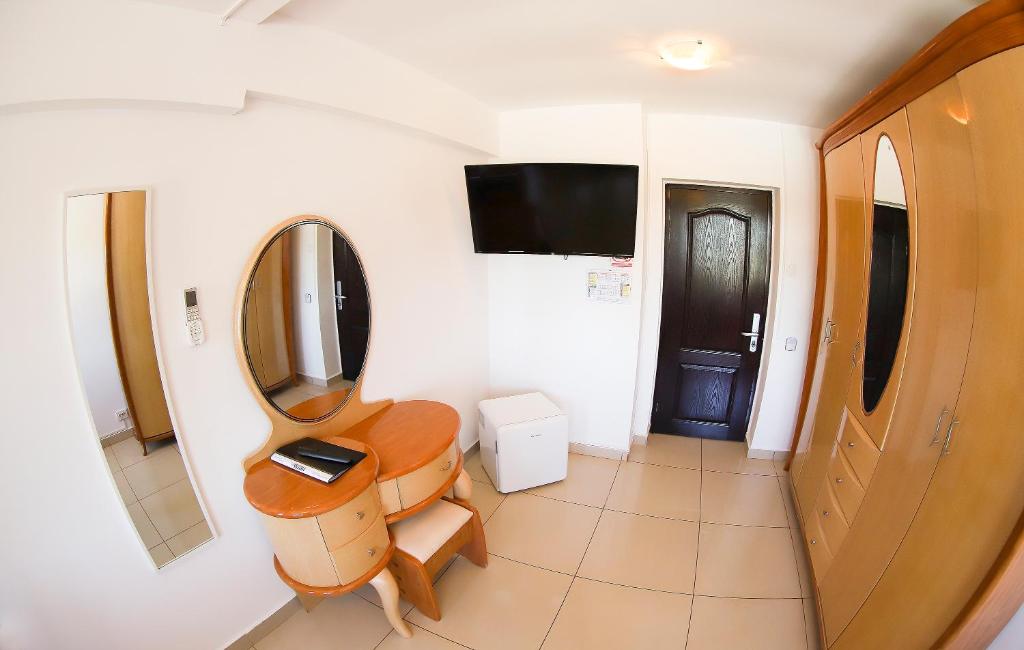 TV a/nebo společenská místnost v ubytování Hotel Proton K3