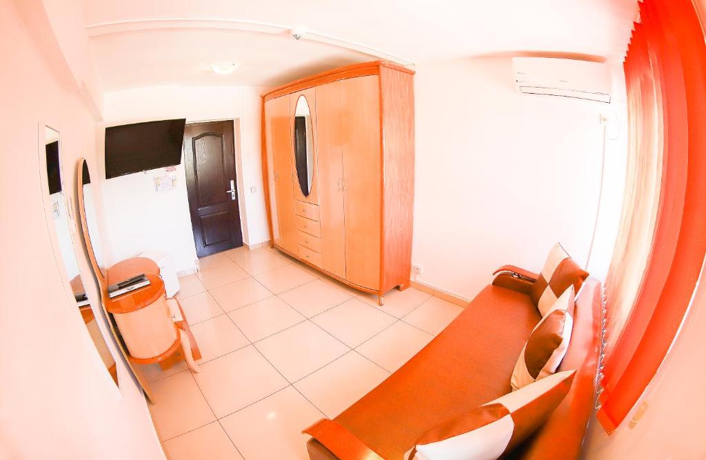 TV a/nebo společenská místnost v ubytování Hotel Proton K3