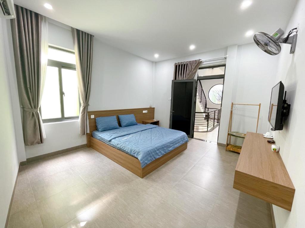 Postel nebo postele na pokoji v ubytování Cá House