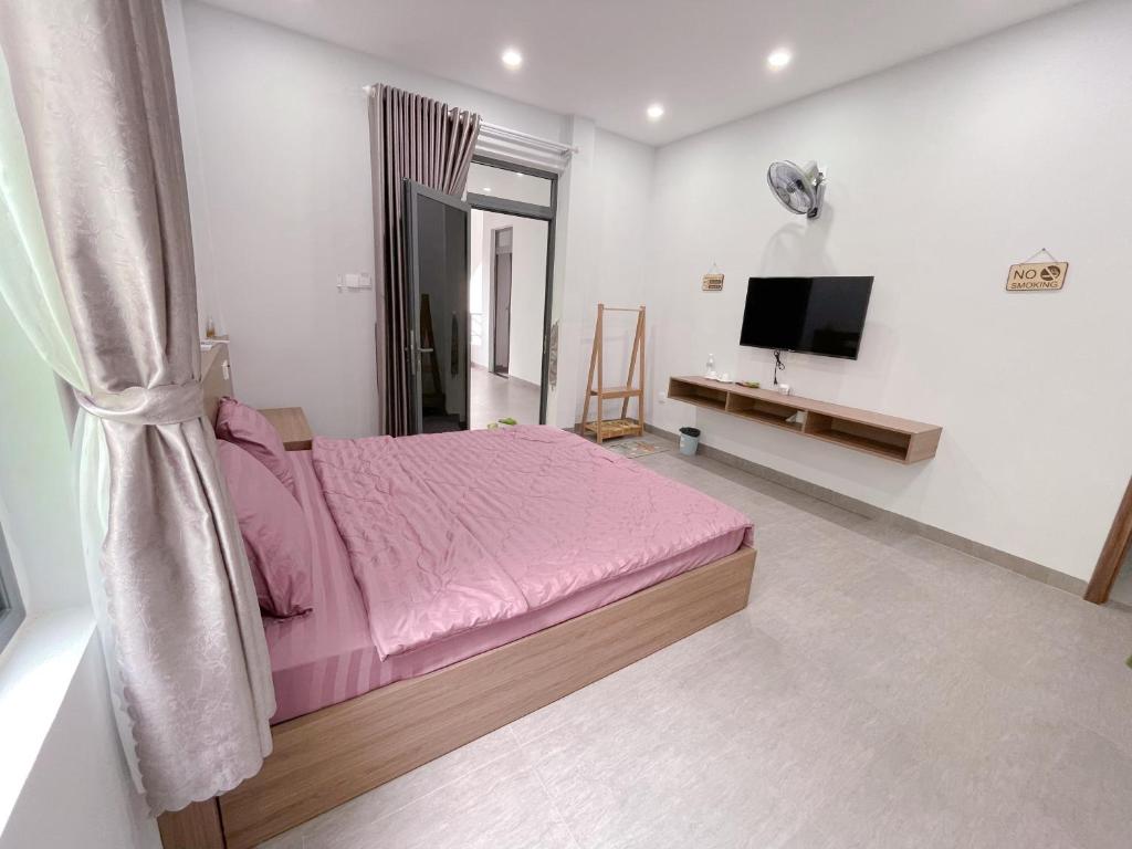 TV a/nebo společenská místnost v ubytování Cá House