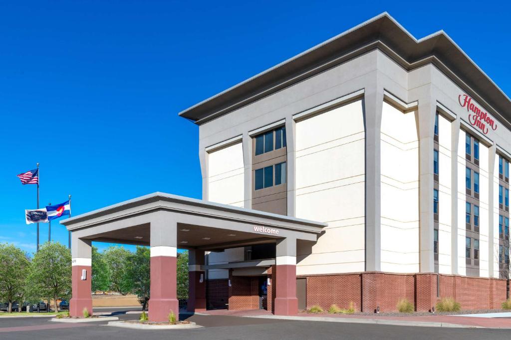 a rendering of the front of a building at Hampton Inn Denver-International Airport in Denver