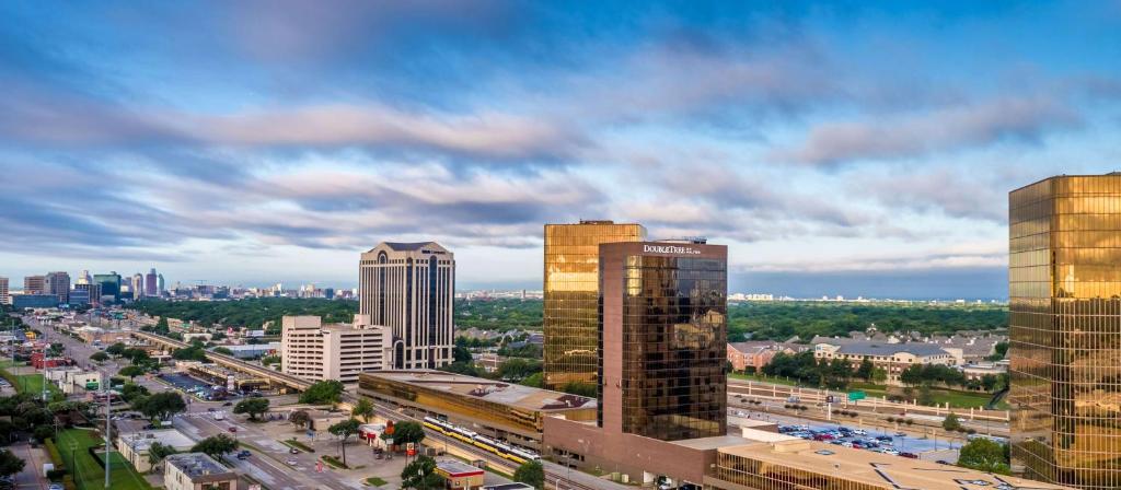 a view of a city skyline with tall buildings at DoubleTree by Hilton Hotel Dallas Campbell Centre in Dallas