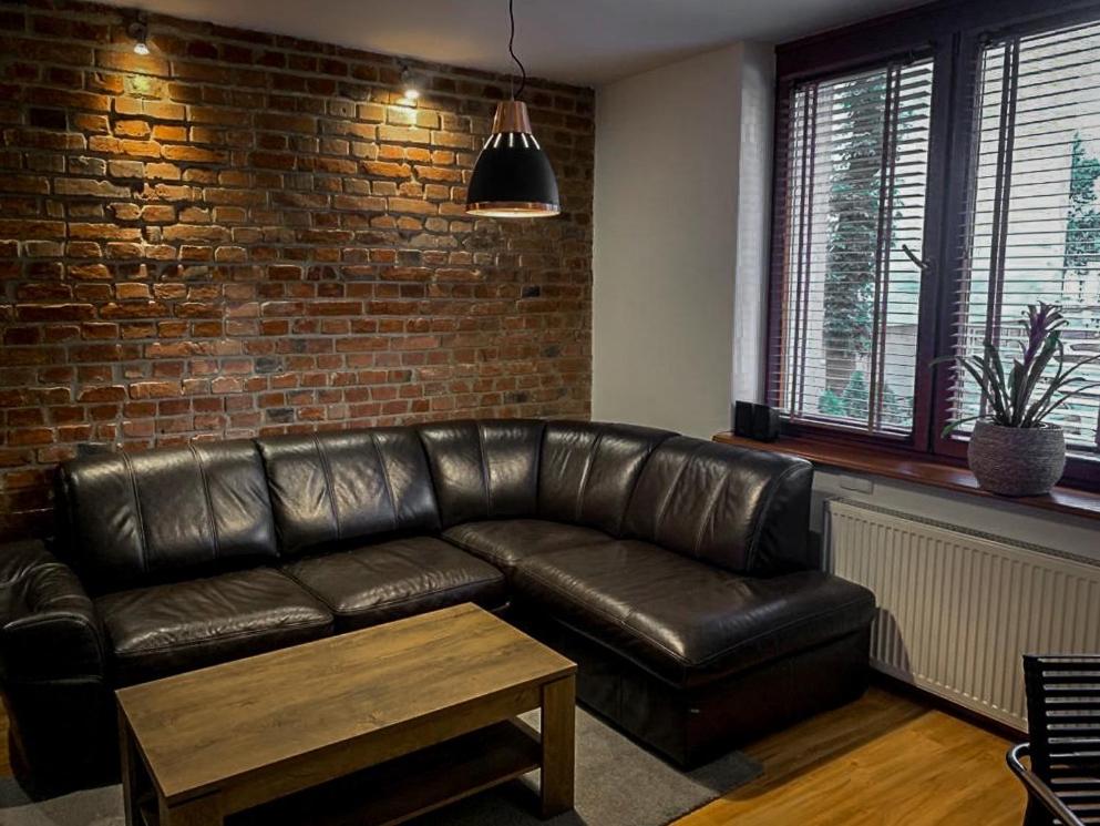 Χώρος καθιστικού στο Apartament za ratuszem