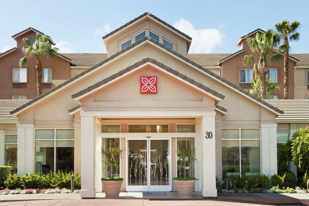 a rendering of the front of a building at Hilton Garden Inn Gilroy in Gilroy