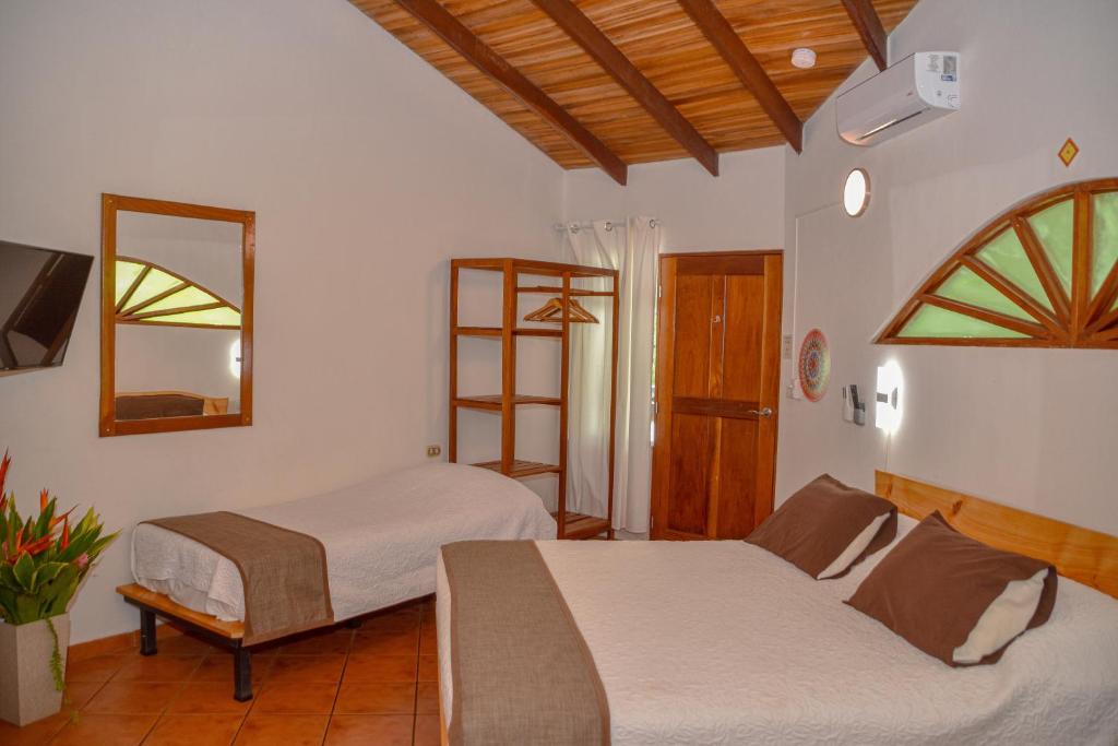 Postel nebo postele na pokoji v ubytování Hotel Luna Llena