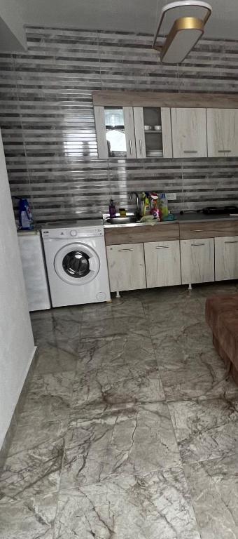 Kuchyň nebo kuchyňský kout v ubytování Apartments Dibra