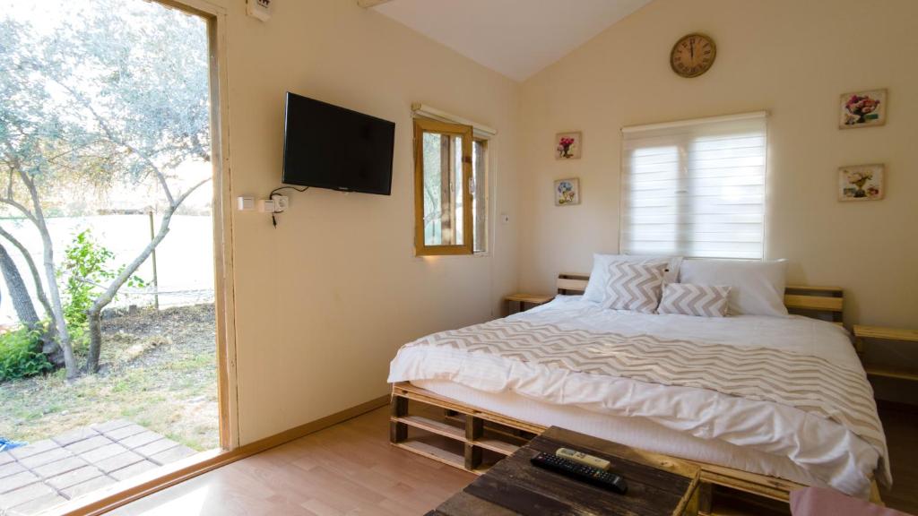 Postel nebo postele na pokoji v ubytování Köklük Wooden House