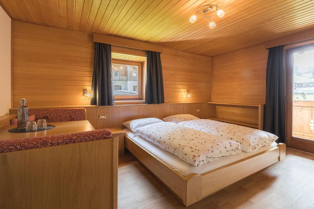 Postel nebo postele na pokoji v ubytování B&B Ciauceia