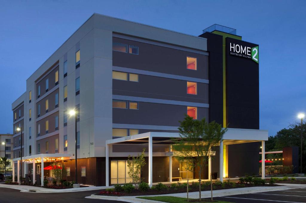 an office building with a home depot sign on it at Home2 Suites by Hilton Arundel Mills BWI Airport in Hanover
