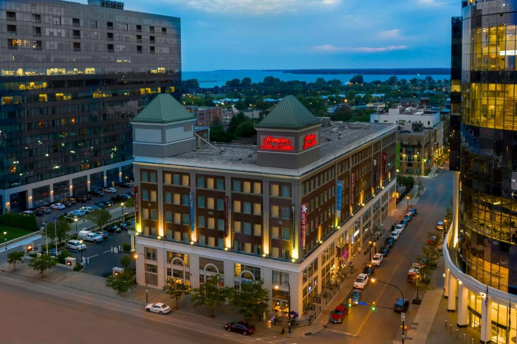 an aerial view of a building in a city at night at Hampton Inn & Suites Buffalo/Downtown in Buffalo