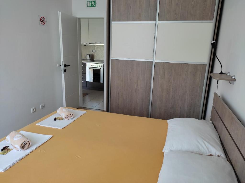 Posteľ alebo postele v izbe v ubytovaní Musa apartment