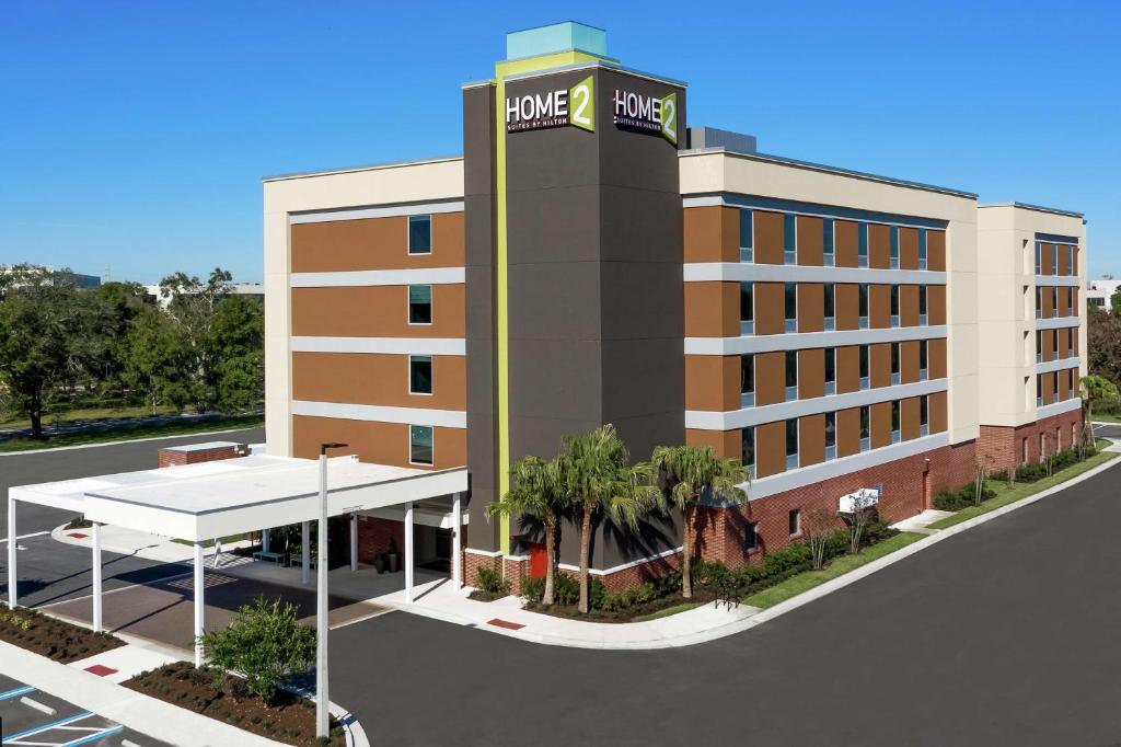 uma imagem de um desenho da frente de um hotel em Home2 Suites By Hilton Orlando Near UCF em Orlando