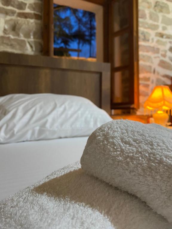 Postel nebo postele na pokoji v ubytování Guest House Ani