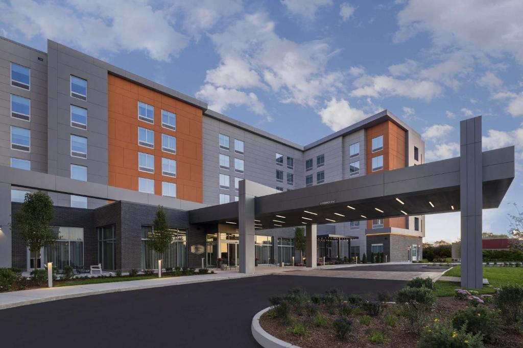 a rendering of the front of a building at Hampton Inn Boston Woburn in Woburn