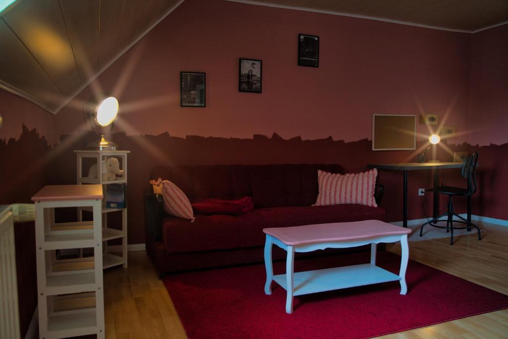 a living room with a couch and a table at KomfortZuhause in Wermelskirchen in Wermelskirchen