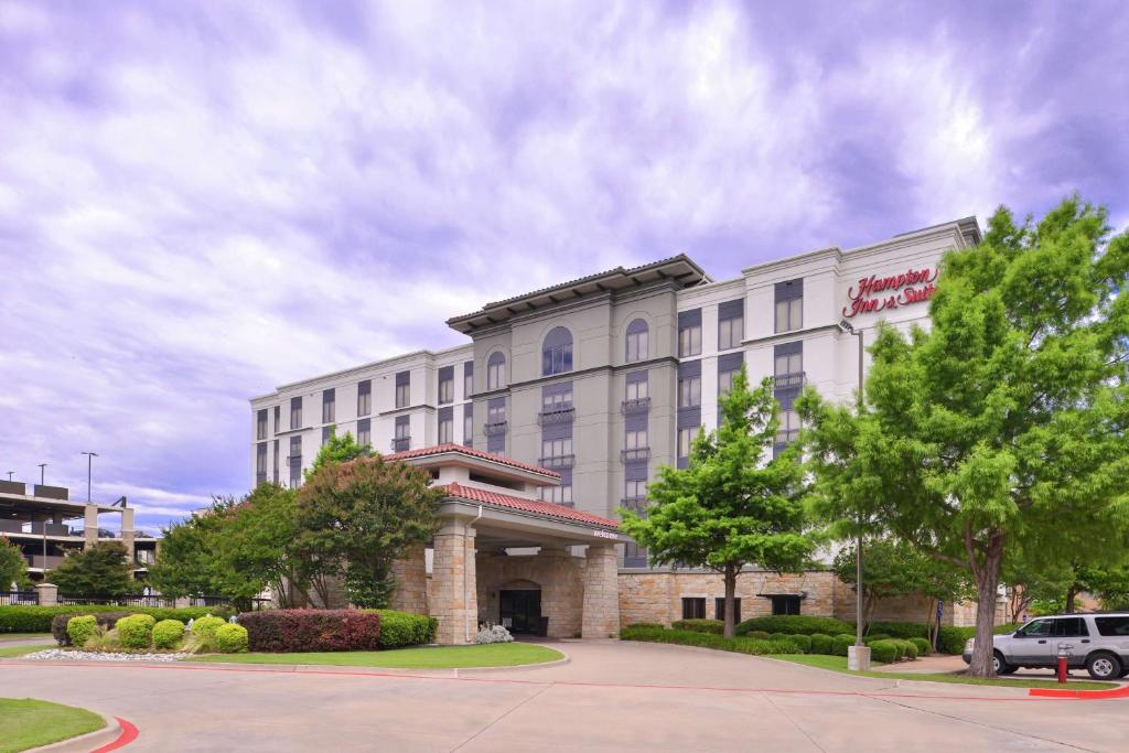 a rendering of a hotel with a building at Hampton Inn & Suites Legacy Park-Frisco in Frisco