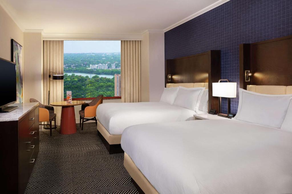Postel nebo postele na pokoji v ubytování Hilton Austin