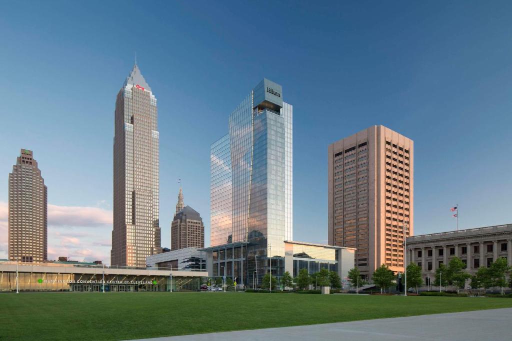 a group of tall buildings in a city at Hilton Cleveland Downtown in Cleveland