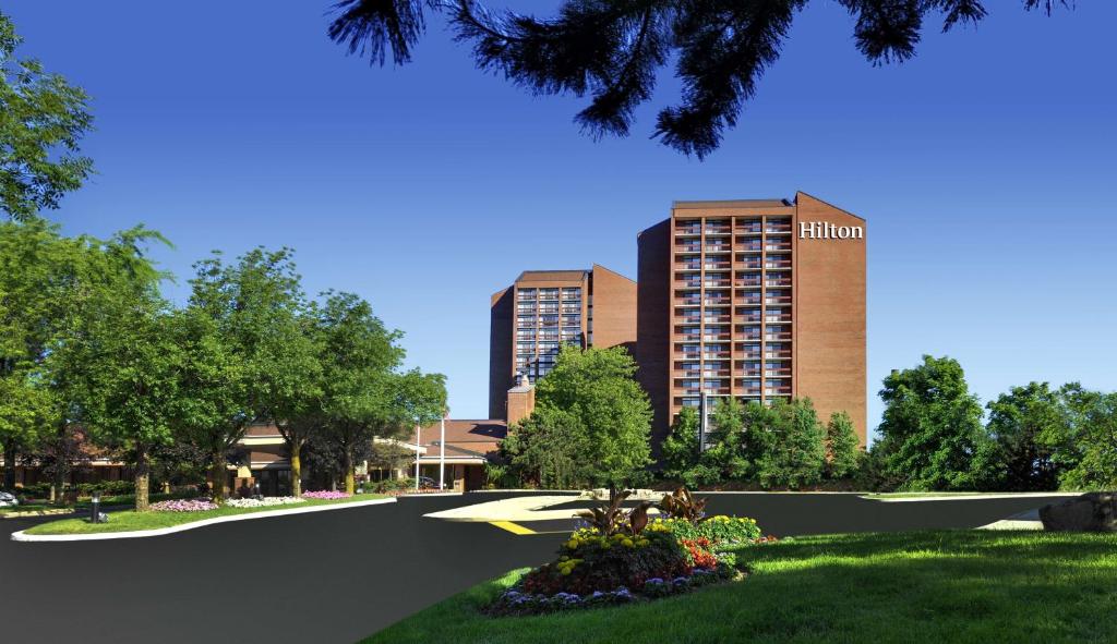 a rendering of a campus with buildings in the background at Hilton Mississauga/Meadowvale in Mississauga