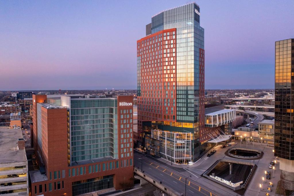 an aerial view of a city with tall buildings at Hilton Columbus Downtown in Columbus