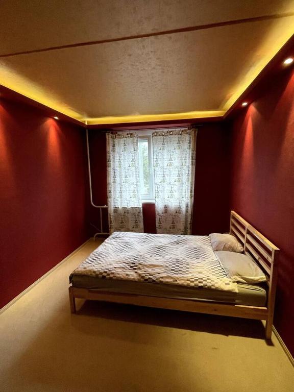 Postel nebo postele na pokoji v ubytování SzigetFesztivál Budapest