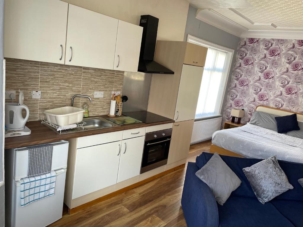 Kuchyň nebo kuchyňský kout v ubytování San Remo Apartments Blackpool