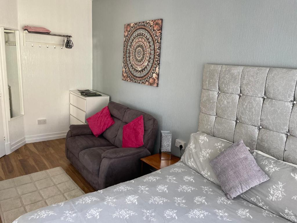 Postel nebo postele na pokoji v ubytování San Remo Apartments Blackpool