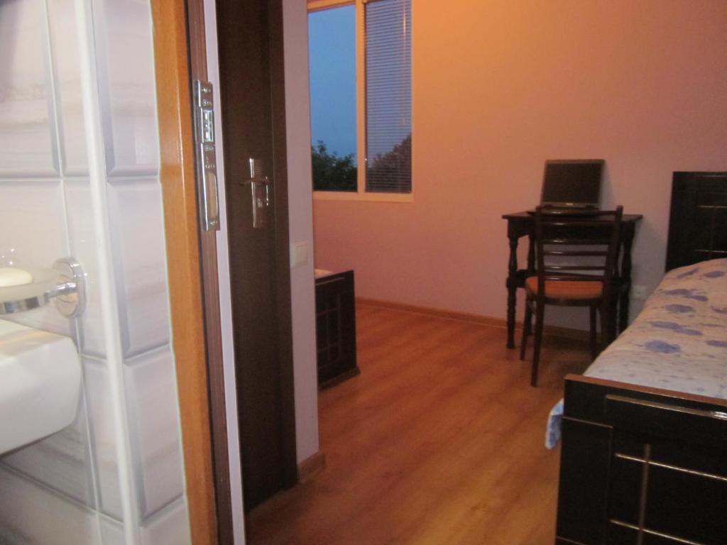 Postel nebo postele na pokoji v ubytování Guest House Ukimerioni