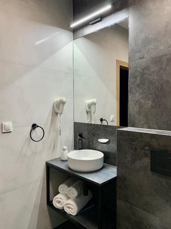 Koupelna v ubytování REMAR - Apartamenty z widokiem na Jezioro Biale