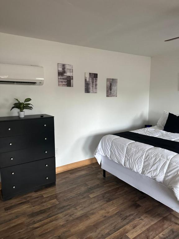 Postel nebo postele na pokoji v ubytování Tiny House