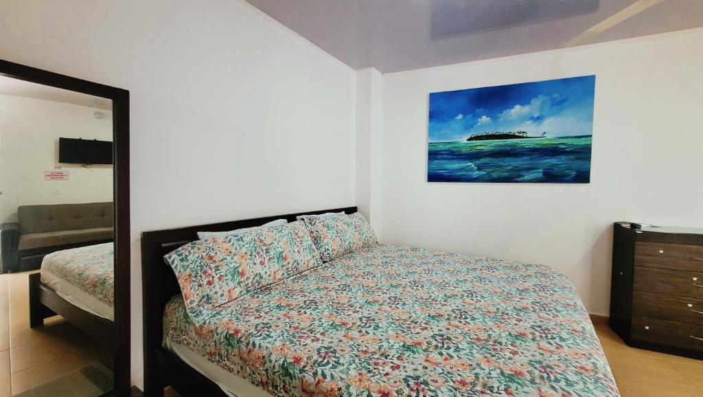 Postel nebo postele na pokoji v ubytování Hotel Olas