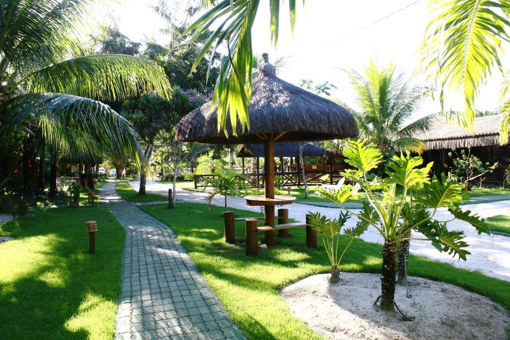 Um jardim em Ecoporan Hotel Charme Spa & Eventos
