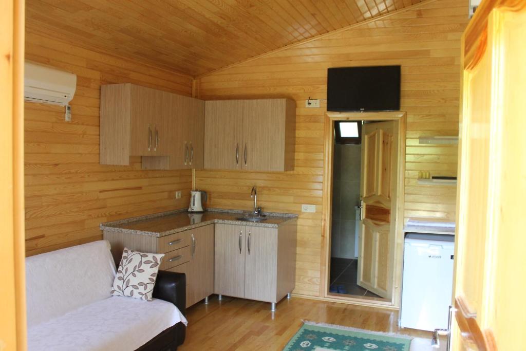 Kuchyň nebo kuchyňský kout v ubytování Merhaba Hotel