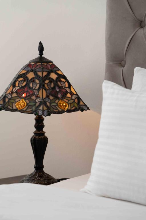 Postel nebo postele na pokoji v ubytování Lotus Colombo Guesthouse