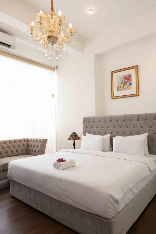Postel nebo postele na pokoji v ubytování Lotus Colombo Guesthouse