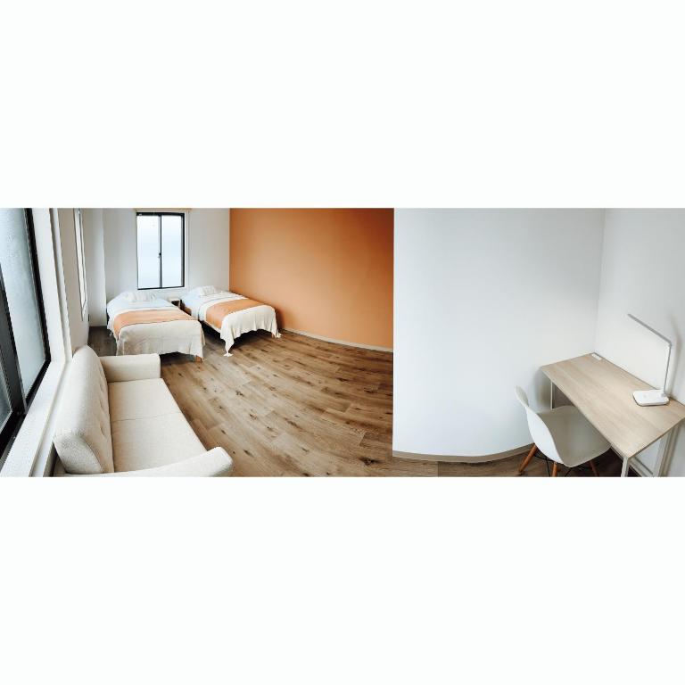 Postel nebo postele na pokoji v ubytování CABIN Nozawaonsen