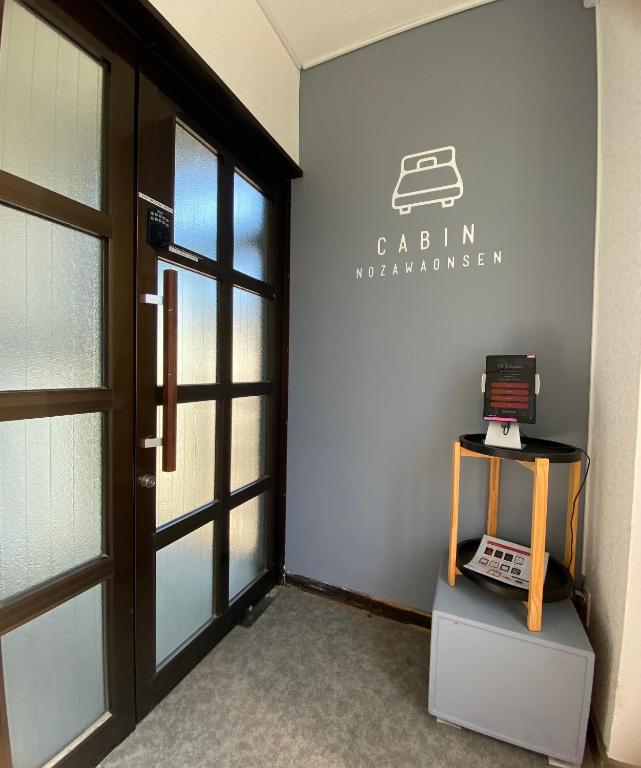 Certifikát, hodnocení, plakát nebo jiný dokument vystavený v ubytování CABIN Nozawaonsen