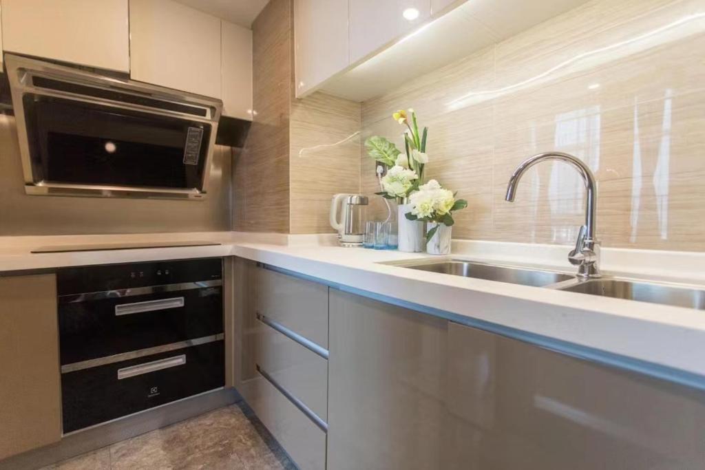 Kuchyň nebo kuchyňský kout v ubytování B T Miele Executive Apartment - Qianhai Square Shenzhen