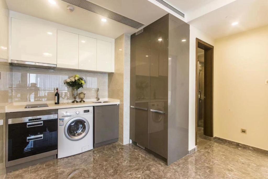 Kuchyň nebo kuchyňský kout v ubytování B T Miele Executive Apartment - Qianhai Square Shenzhen