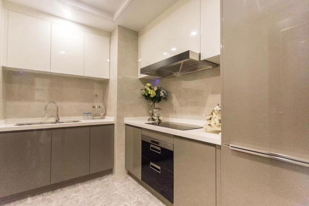 Kuchyň nebo kuchyňský kout v ubytování B T Miele Executive Apartment - Qianhai Square Shenzhen