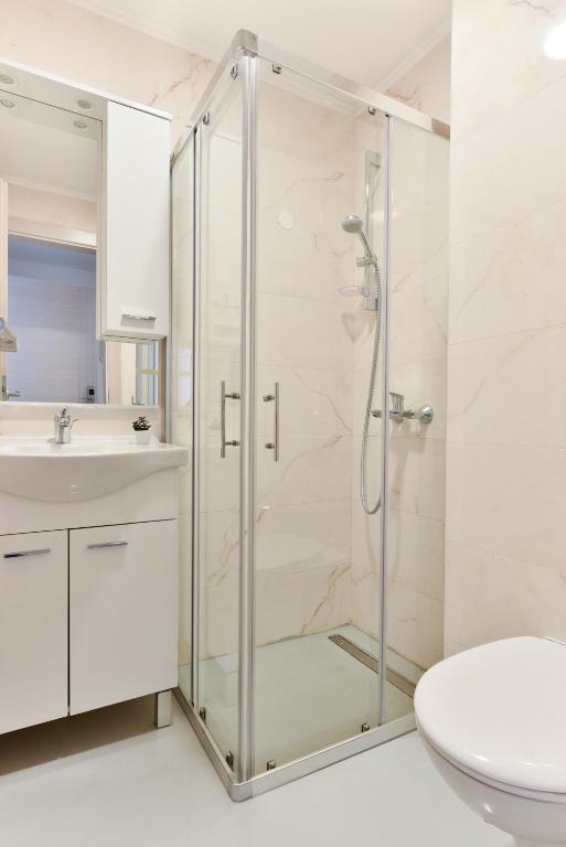 Koupelna v ubytování Hotel Dompes