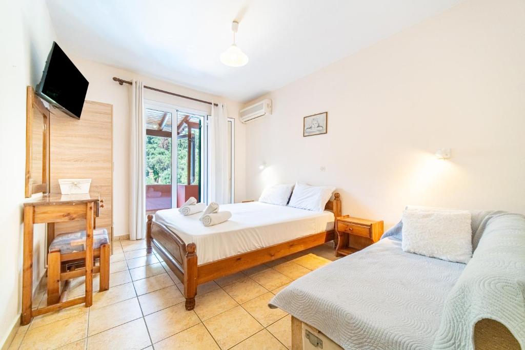 Postel nebo postele na pokoji v ubytování Arianna apartment 17